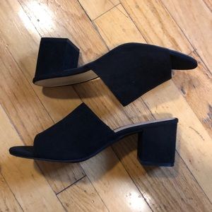 Black heeled mules